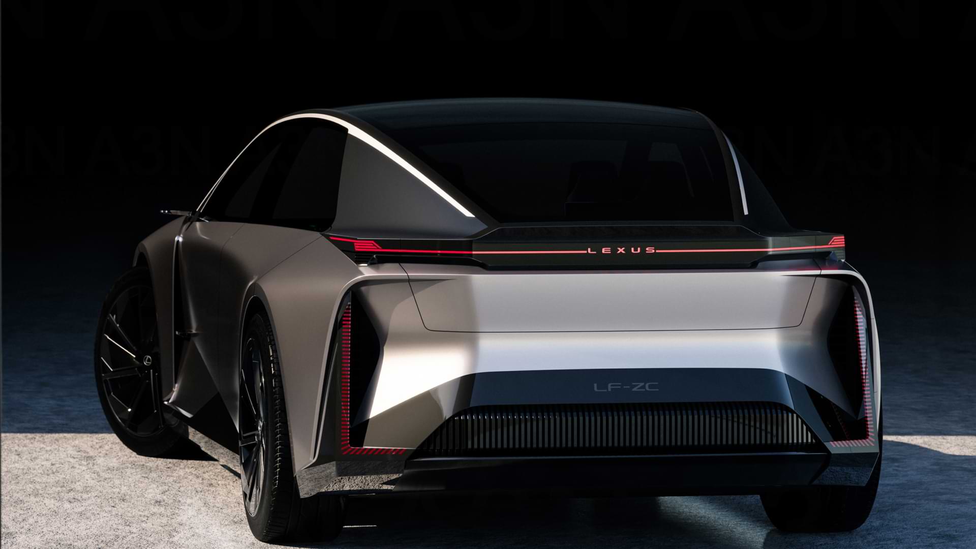 Back view of a car with red rear lights.