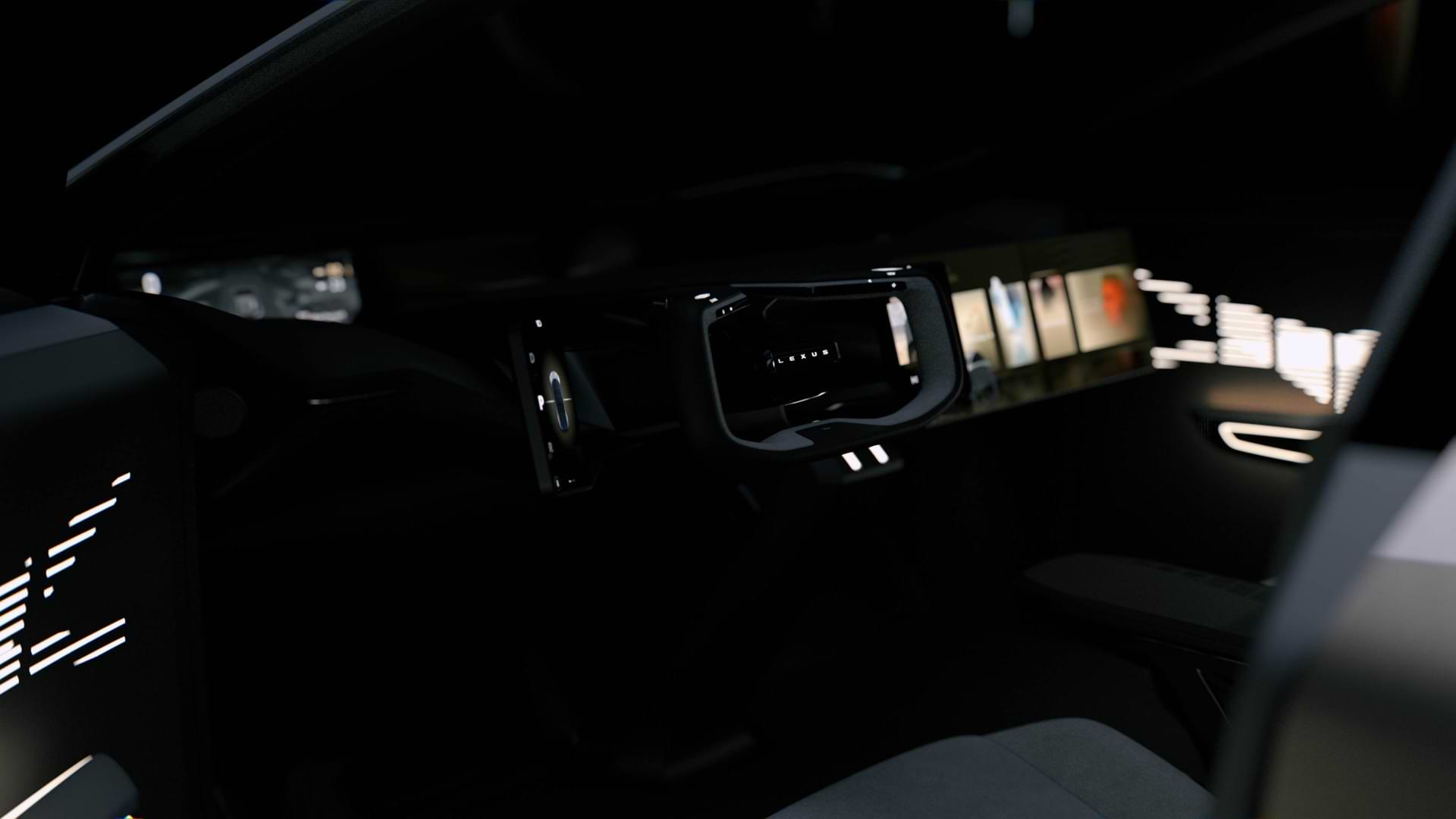 Interior of a car focusing on the steering wheel with "Lexus" flashing.