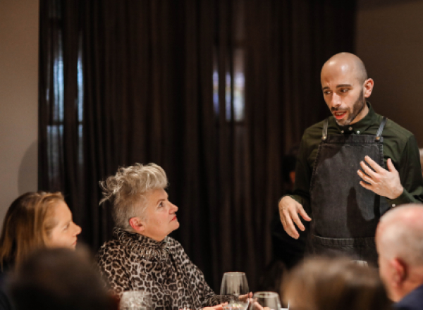 Guests talking to the head chef at Attica 2019